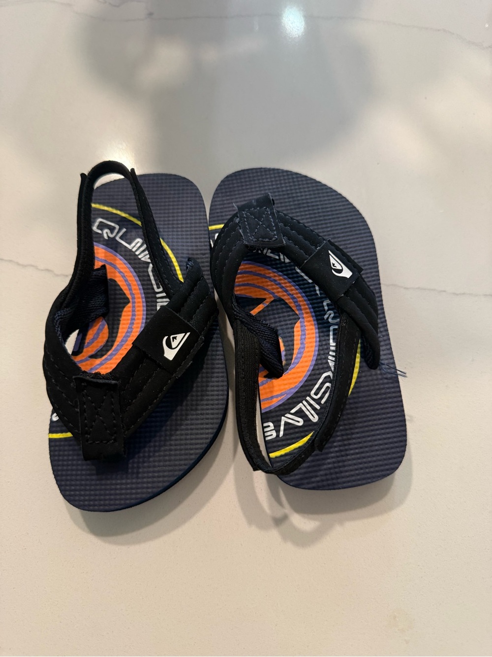 Quiksilver Kids Black Flip Sandals with Orange & Yellow Graphic Footbed
